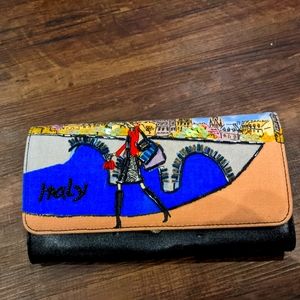 Unique wallet with embroidered front